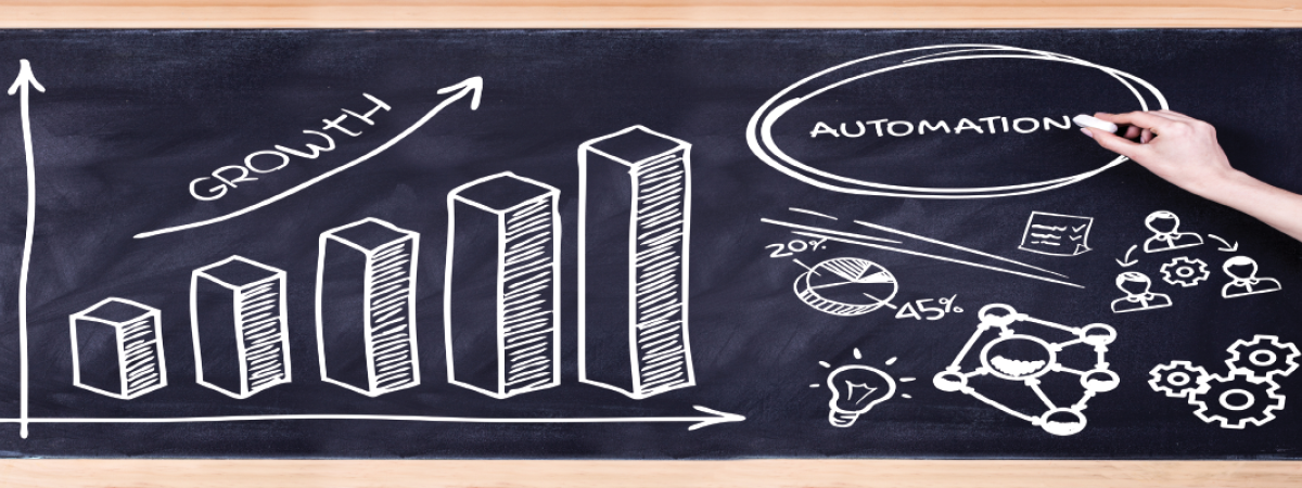 image of a chalkboard with a graph drawn on it that says growth. And a hand writing the word Automation on the board. 